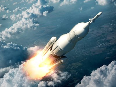 Space Launch System Flying Over The Clouds. 3D Scene. Space Launch System Flying Over The Clouds. 3D Scene.